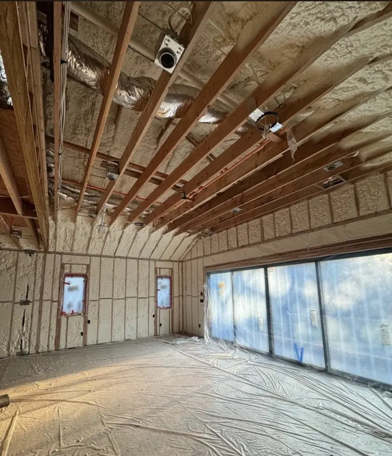 Interior walls and ceiling insulated with spray foam during new construction in Hickory